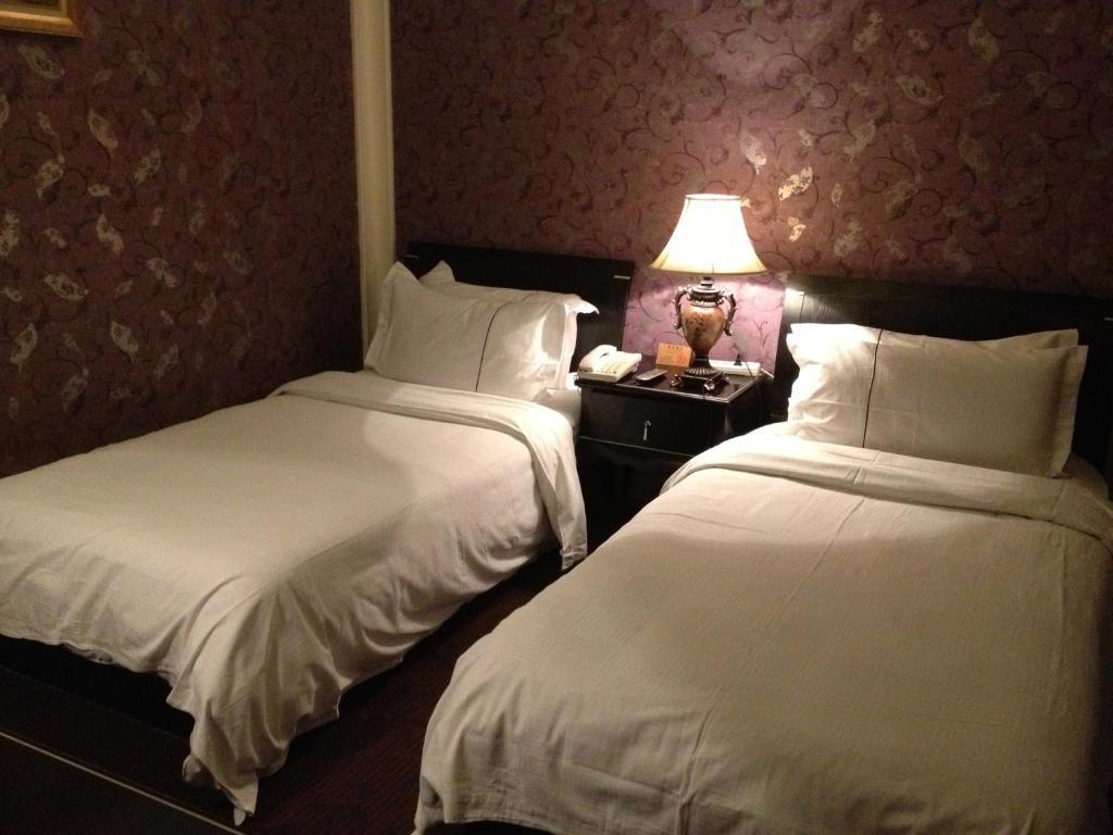 Manhattan Jinling Hotel Xangai Exterior foto