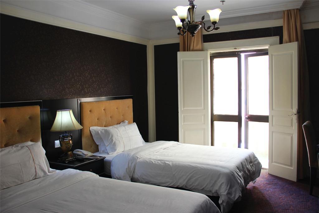 Manhattan Jinling Hotel Xangai Quarto foto