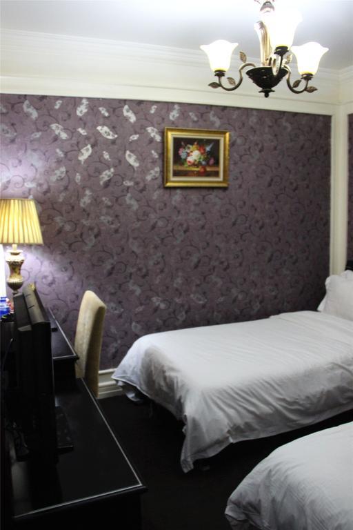Manhattan Jinling Hotel Xangai Quarto foto